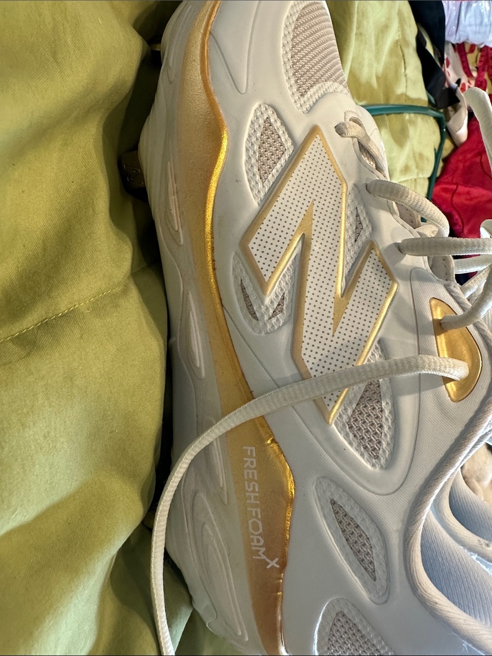 New Balance White and Gold Women’s Fresh Foam Athletic Sneaker